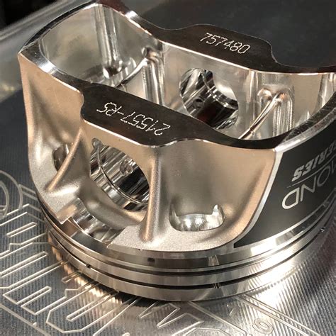 The gaps for the three oil rings spread apart evenly around the piston. . Diamond pistons